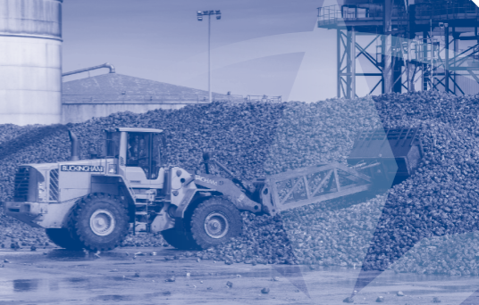 Tractor pushing sugarbeet